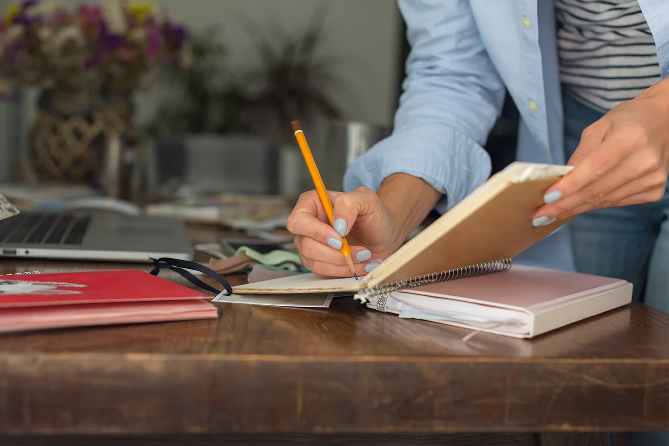 close-up-woman-writing-notebook